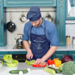 Chef cooking vegetarian recipe. Vegetarian cuisine rich vitamins. Man chef wear apron cooking in kitchen. Man cook vegetarian recipe with fresh vegetables. Vegetarian diet concept. Culinary recipe.